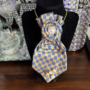 Elegant Blue and Yellow Patterned Necktie with Pearl Accent